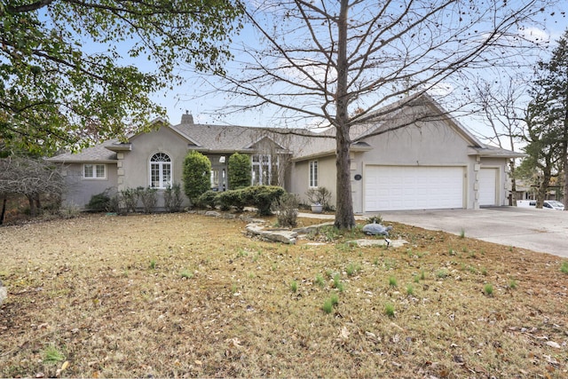 single story home with a garage