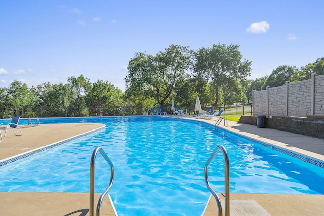 view of pool featuring a patio area