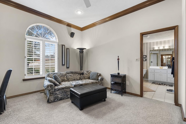 carpeted living room featuring ornamental molding