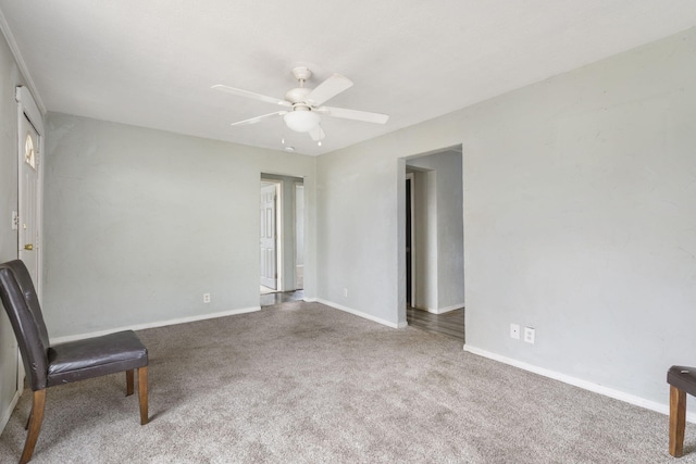 unfurnished room with ceiling fan and carpet floors