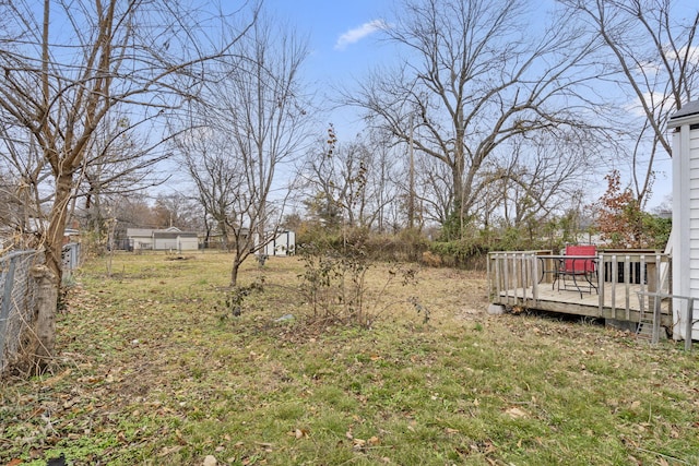 view of yard featuring a deck