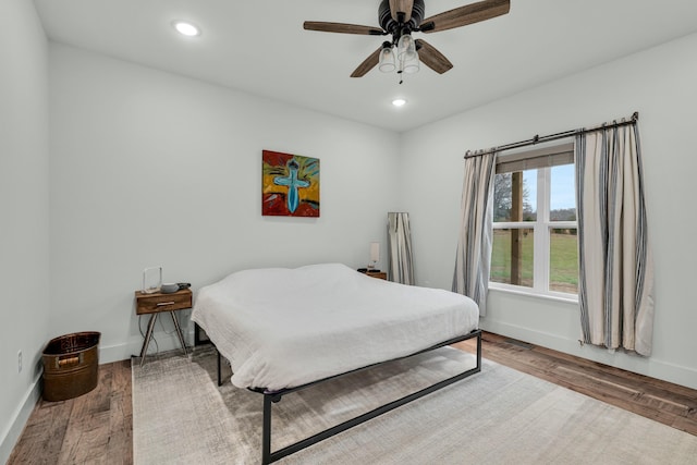 8532 County Road 6890, West Plains, MO 65775 - bedroom with hardwood / wood-style floors and ceiling fan