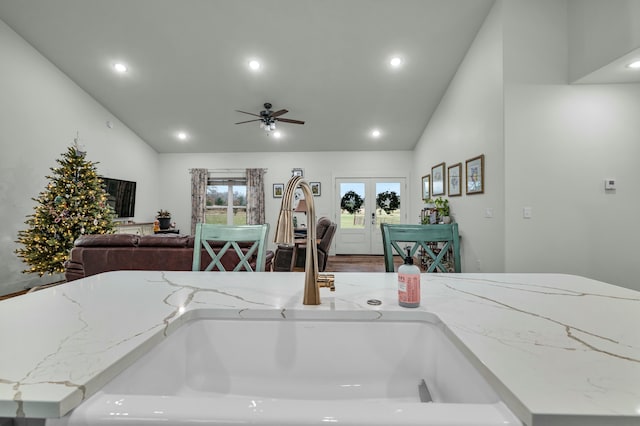 8532 County Road 6890, West Plains, MO 65775 - kitchen with french doors, sink, vaulted ceiling, ceiling fan, and light stone countertops