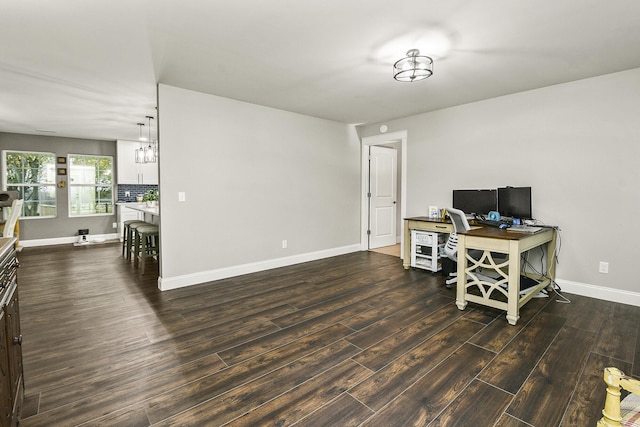 home office featuring dark hardwood / wood-style flooring