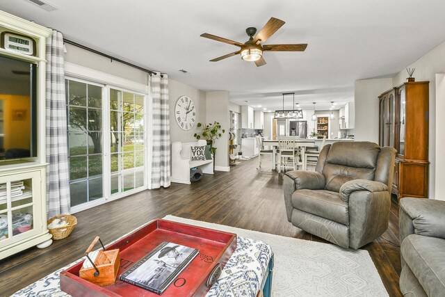 2314 State Highway 38, Elkland, MO 65644 - living room featuring dark wood-style flooring and a ceiling fan