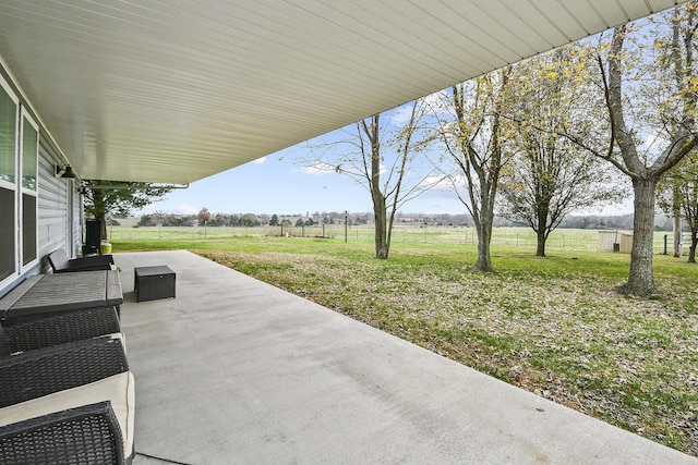 view of patio with a rural view