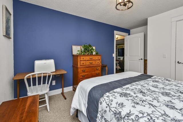 2314 State Highway 38, Elkland, MO 65644 - bedroom featuring carpet and a textured ceiling
