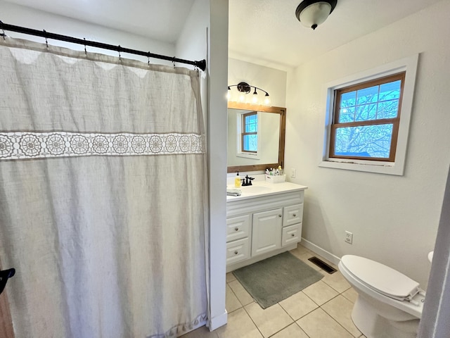 full bath featuring tile patterned floors, visible vents, toilet, baseboards, and vanity