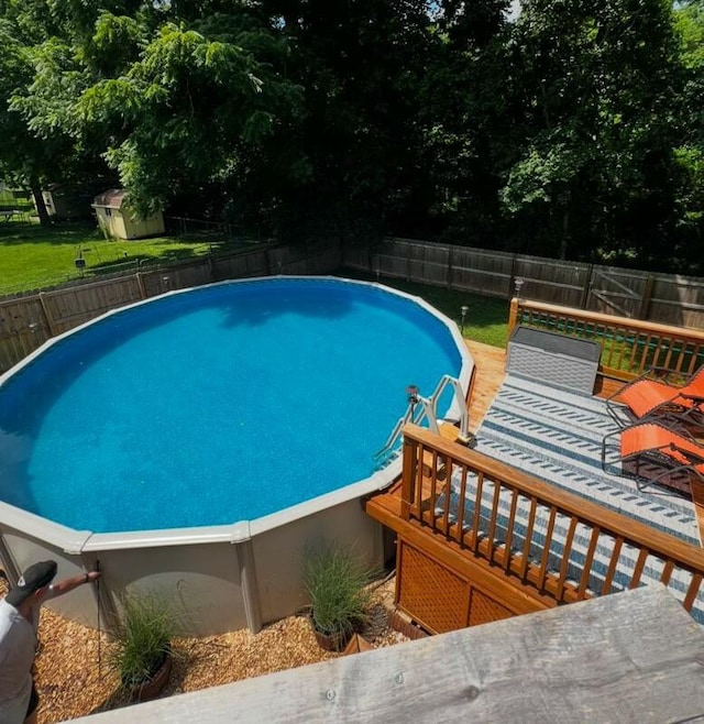 view of pool with a deck