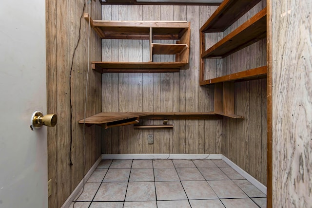 washroom featuring light tile patterned flooring