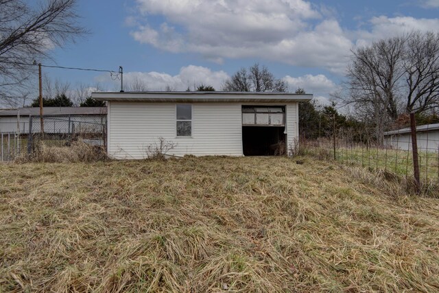 view of outdoor structure featuring a yard