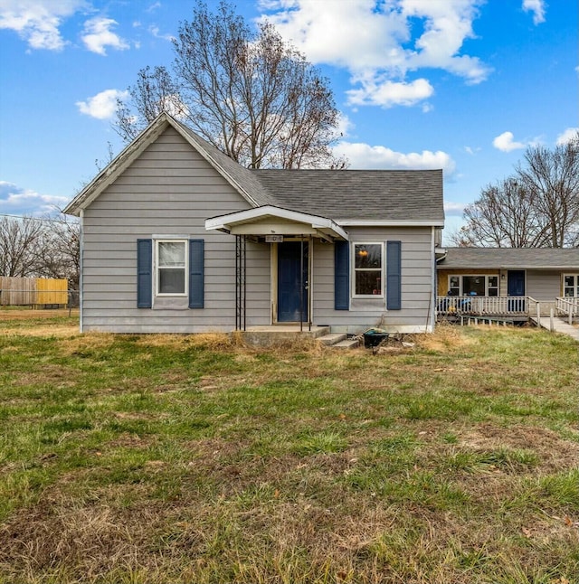 view of front of home with a front yard