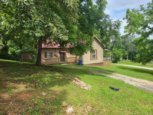 exterior space with a yard