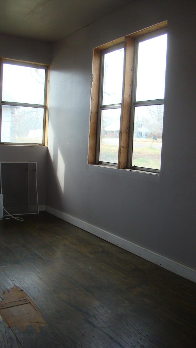 unfurnished room featuring a fireplace