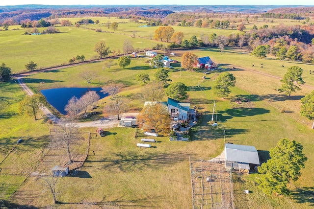 bird's eye view with a rural view and a water view