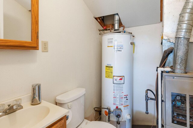 utility room featuring sink and water heater