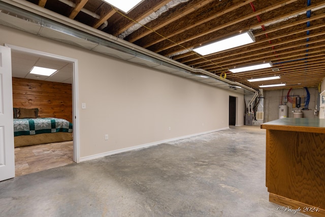 basement with heating unit and water heater