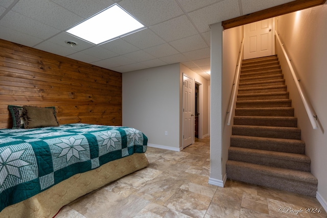 bedroom featuring a paneled ceiling