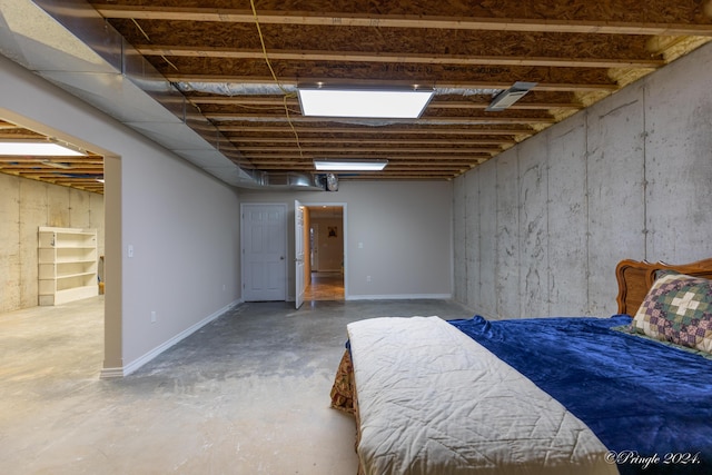 bedroom with concrete floors