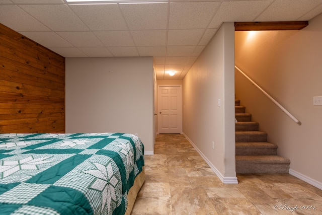 bedroom with a paneled ceiling