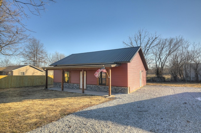 view of front of house with a patio area