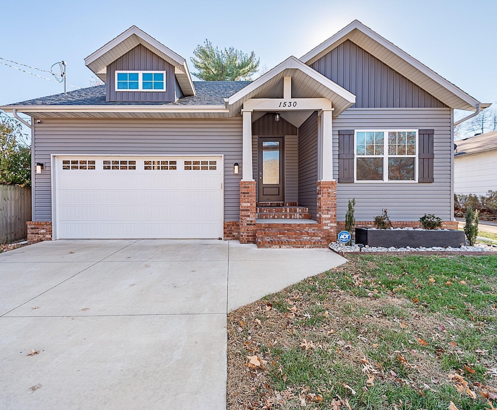 craftsman-style home featuring a garage