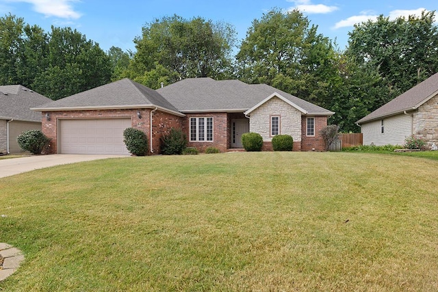 ranch-style home featuring a front yard and a garage