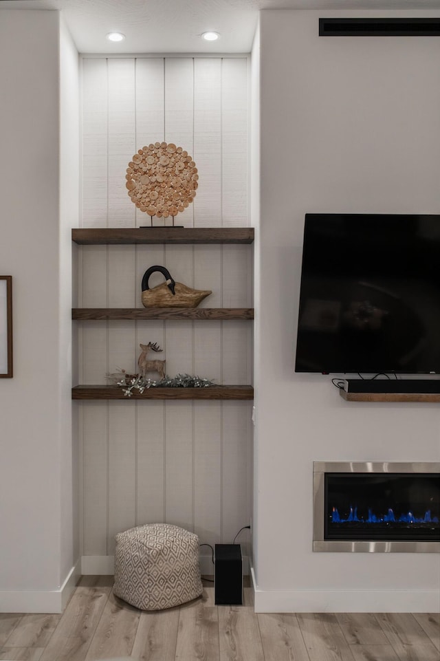 interior details featuring wood-type flooring