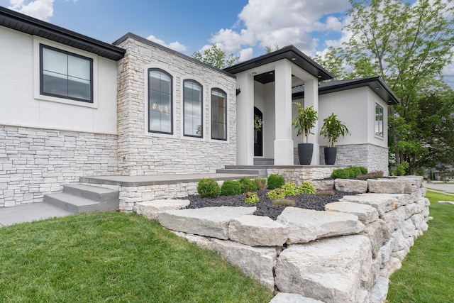 view of front of home with a front lawn