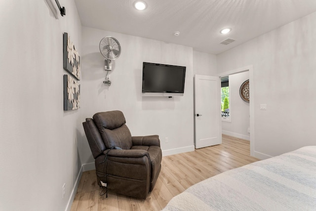 bedroom with light hardwood / wood-style flooring