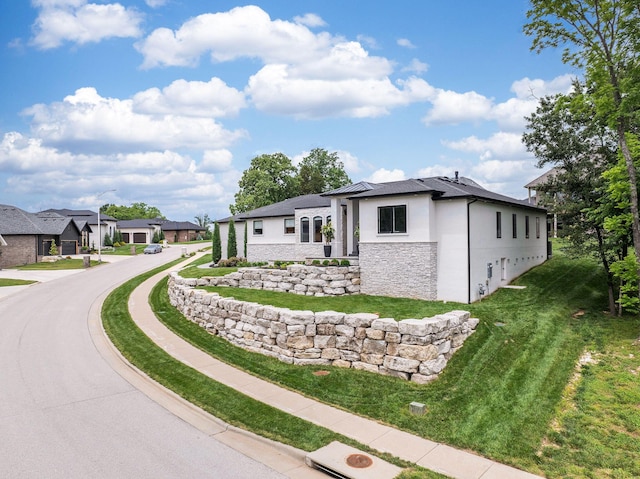 view of side of home featuring a yard