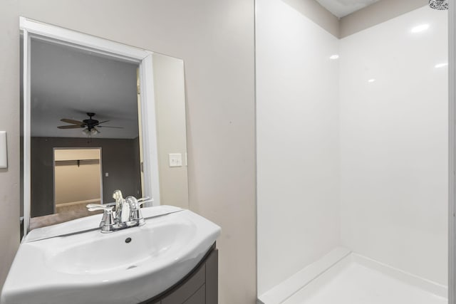 bathroom featuring ceiling fan and vanity