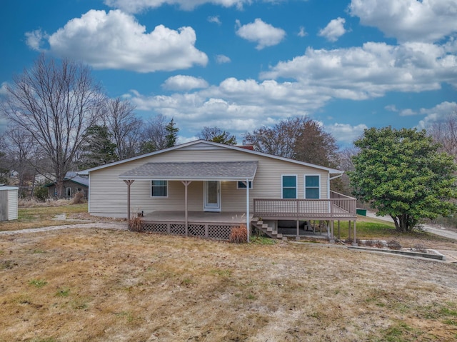 view of front of property with a deck