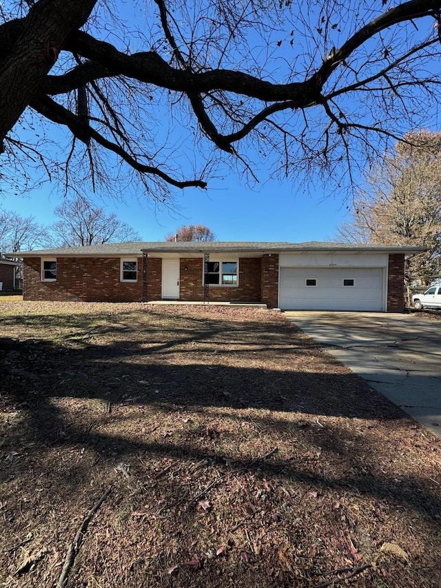 single story home with a garage