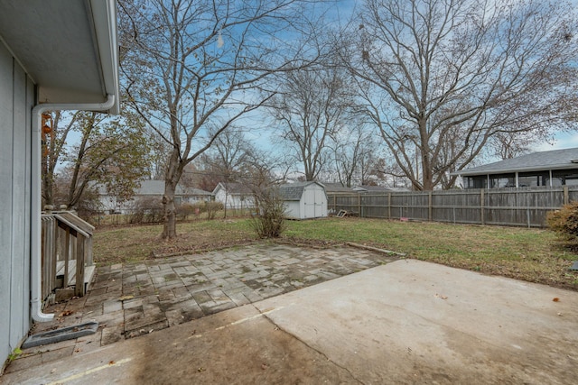 view of patio / terrace with a shed