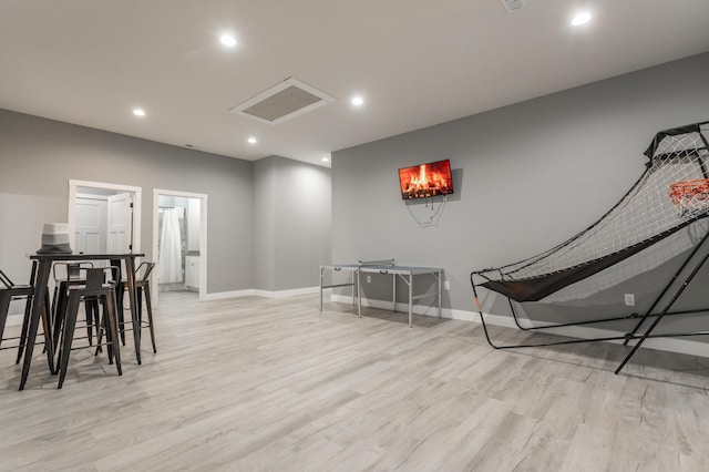 playroom featuring light hardwood / wood-style floors