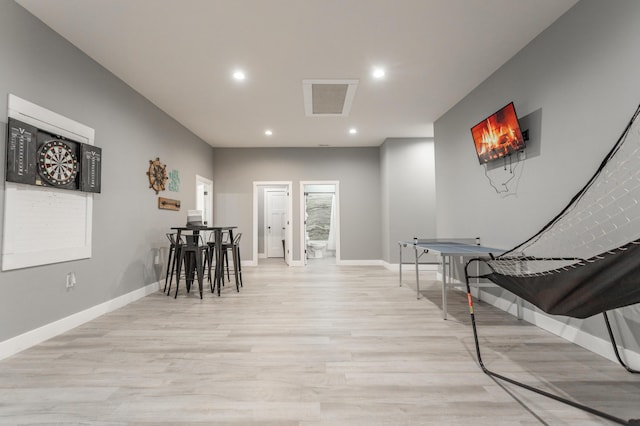 living area with light hardwood / wood-style floors