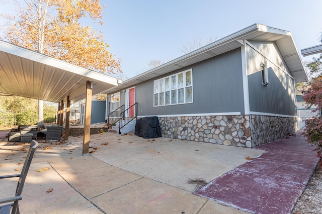 exterior space with a patio area