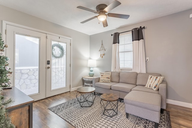 living room with french doors, ceiling fan, and hardwood / wood-style floors