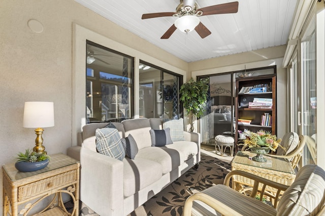 sunroom featuring wooden ceiling