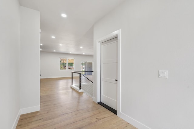 252 Hickory Hills Blvd, Springfield, MO 65802 - corridor featuring baseboards, an upstairs landing, light wood-type flooring, and recessed lighting