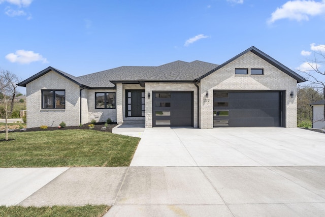 252 Hickory Hills Blvd, Springfield, MO 65802 - view of front of property featuring roof with shingles, concrete driveway, brick siding, a front yard, and a garage