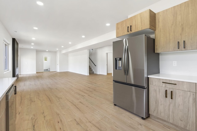 252 Hickory Hills Blvd, Springfield, MO 65802 - kitchen with modern cabinets, light wood-style flooring, light countertops, and appliances with stainless steel finishes