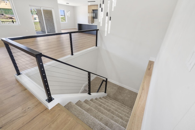 252 Hickory Hills Blvd, Springfield, MO 65802 - stairway featuring baseboards and wood finished floors