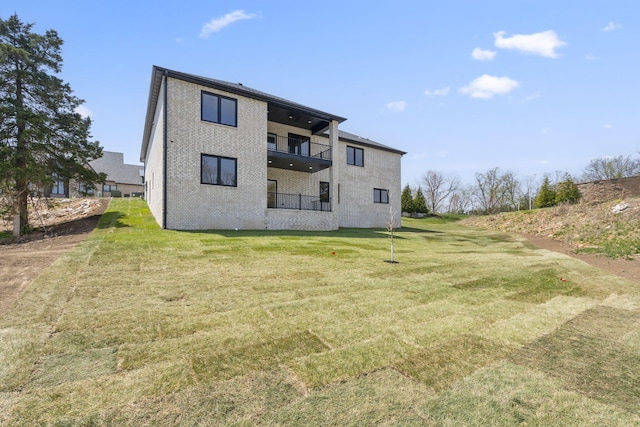 252 Hickory Hills Blvd, Springfield, MO 65802 - back of property with a lawn and a balcony