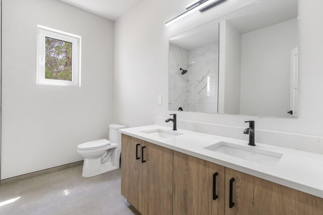 252 Hickory Hills Blvd, Springfield, MO 65802 - bathroom with a marble finish shower, a sink, double vanity, and toilet