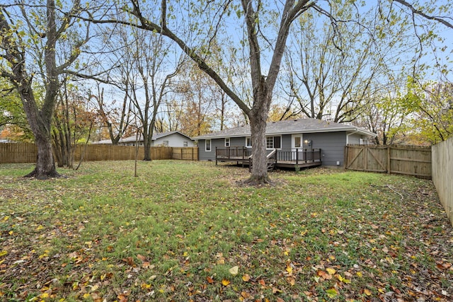 view of yard with a deck