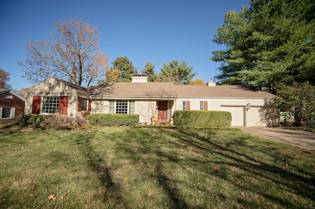 ranch-style home with a front yard and a garage