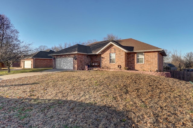 ranch-style home with a garage