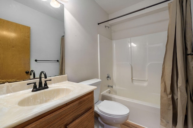 full bathroom with vanity, toilet, and shower / tub combo